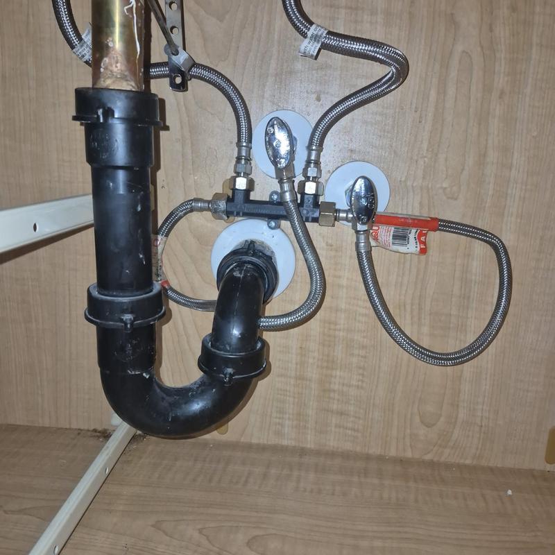 Water heater recirculating pump supply lines and trap Water heater recirculating pump supply lines and trap