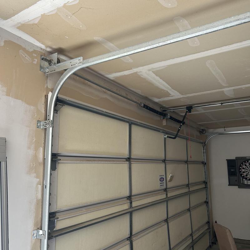 Garage door track and spring system installation