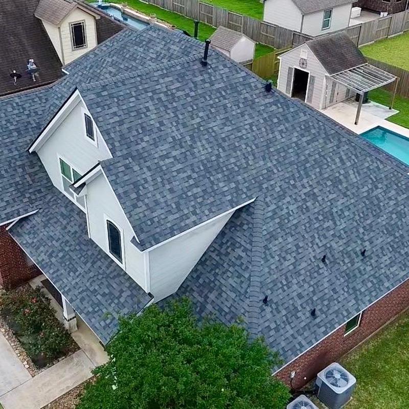 Estate Grey Owens Corning roof with hand-nailed shingles