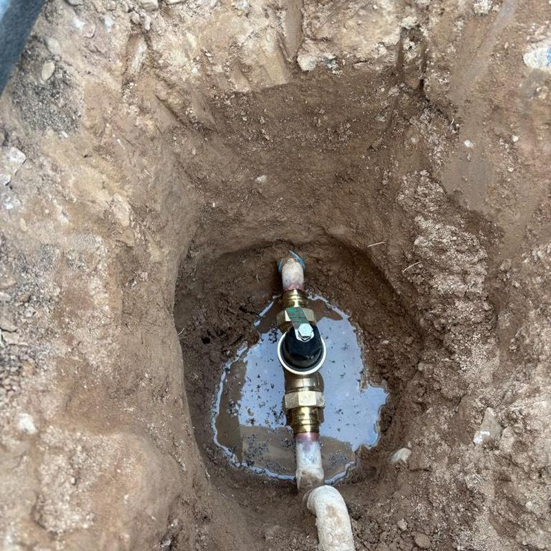 Water main pressure regulator valve installation hole