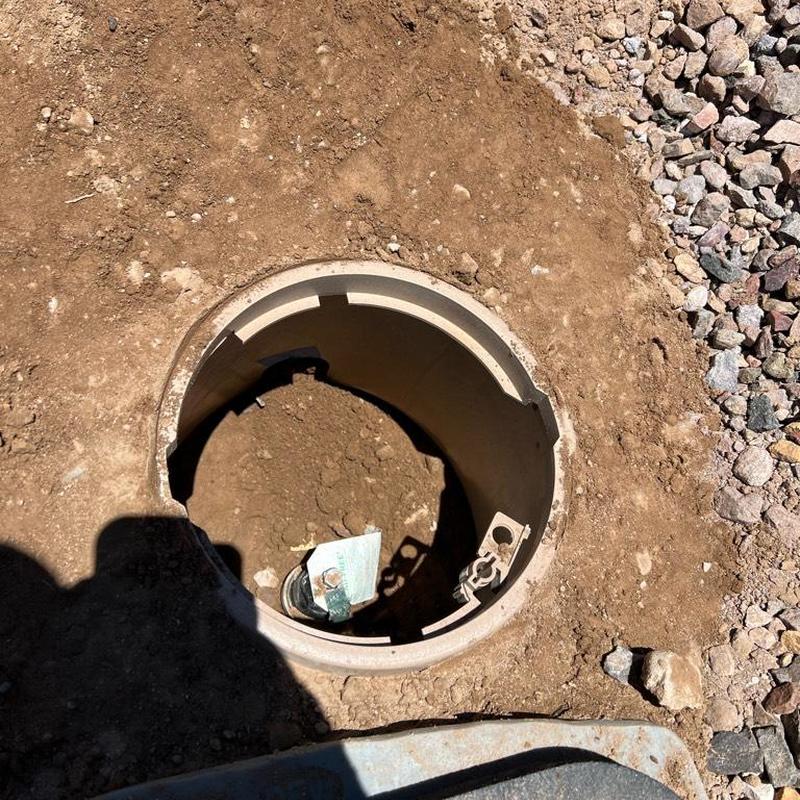 Pressure regulating valve in valve box with exposed dirt