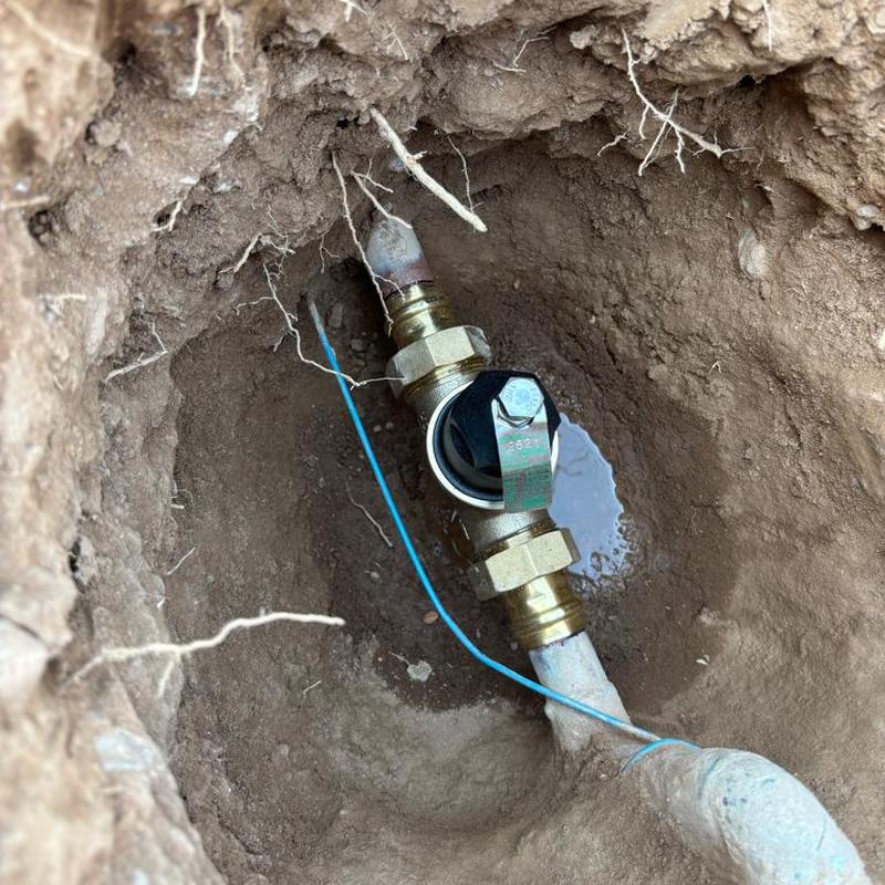 Pressure relief valve installed next to water meter box