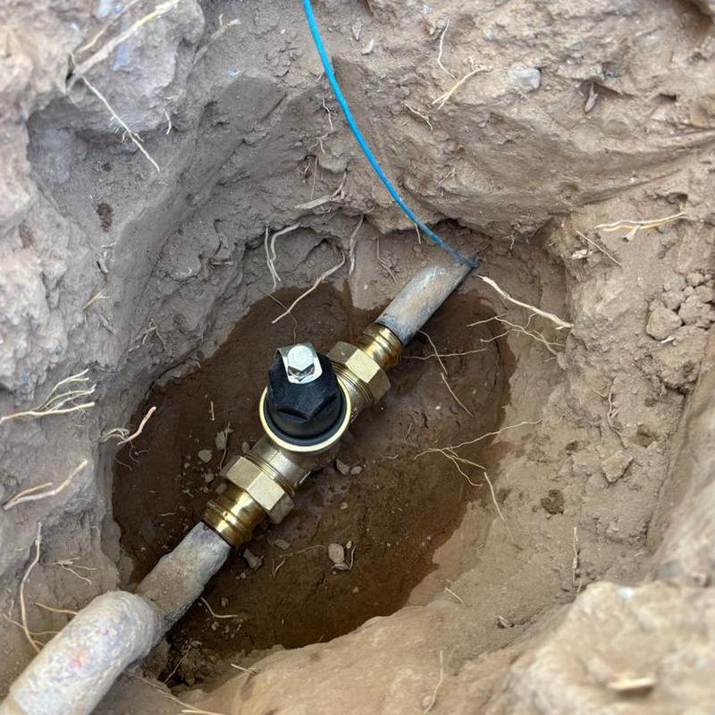 Pressure relief valve installed next to main water curb stop