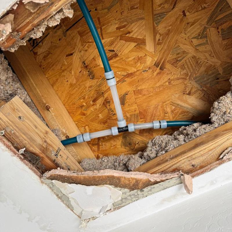12 PEX water line leak with new tee and couplings installed