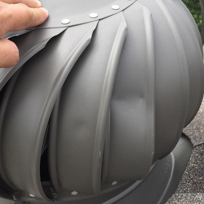 Roof turbine vent with dented metal surface