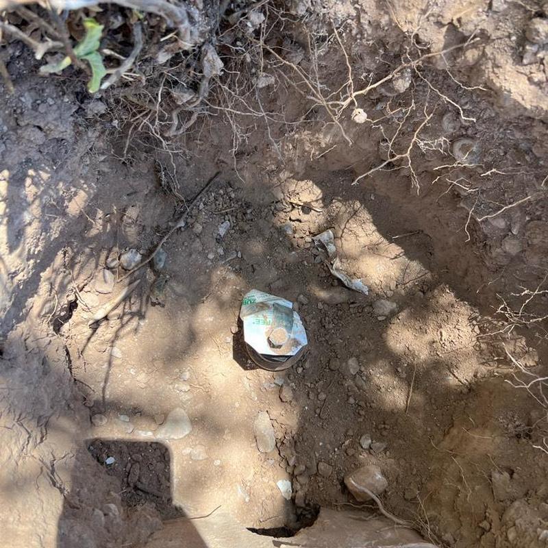 Pressure regulating valve installation in excavated soil hole