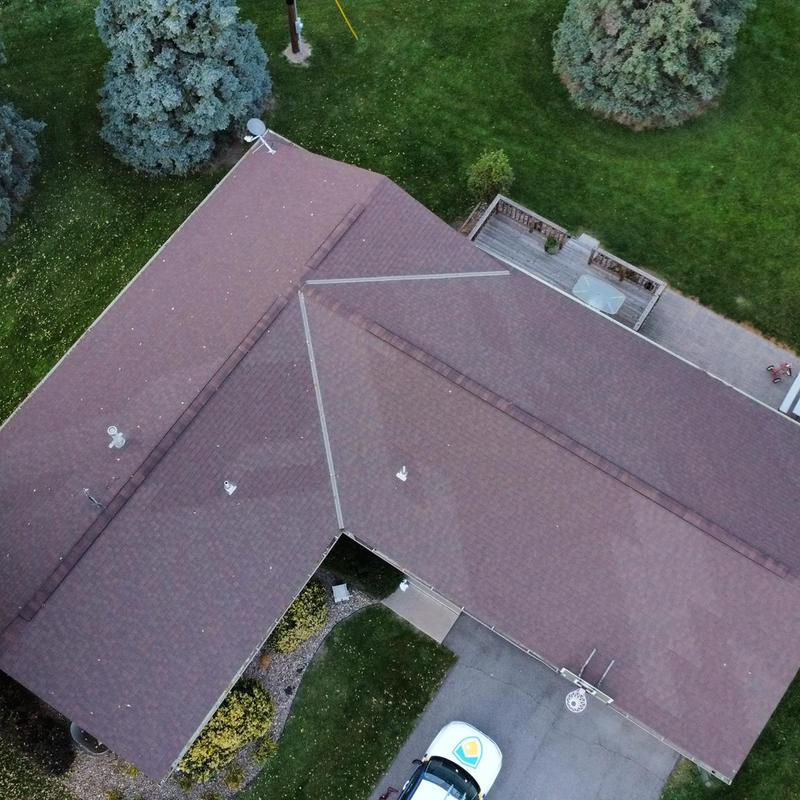 Asphalt shingle roof with hail damage inspection in Hastings