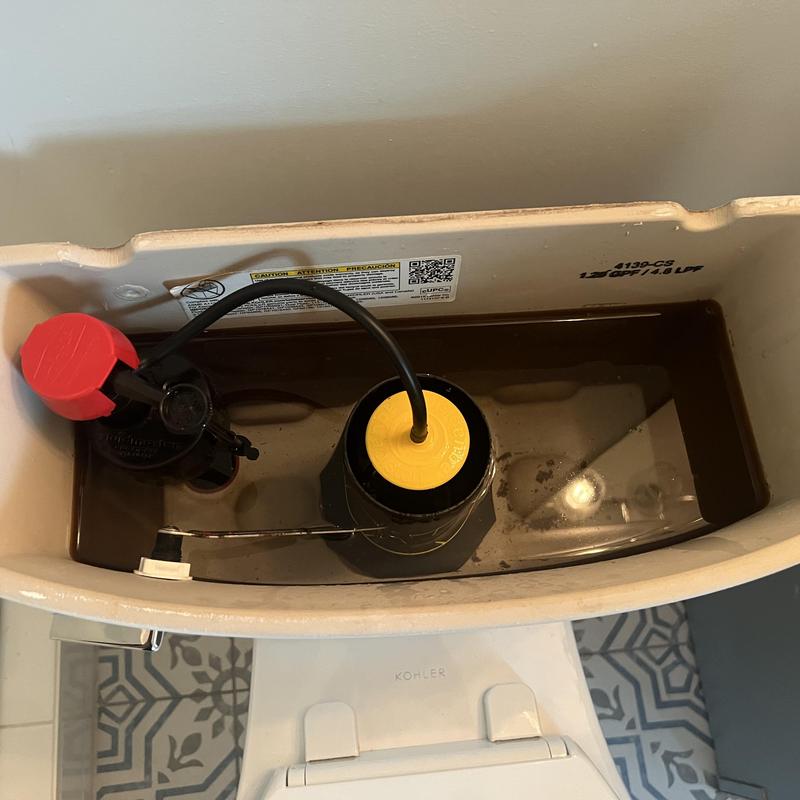 Toilet fill valve inside tank with water level