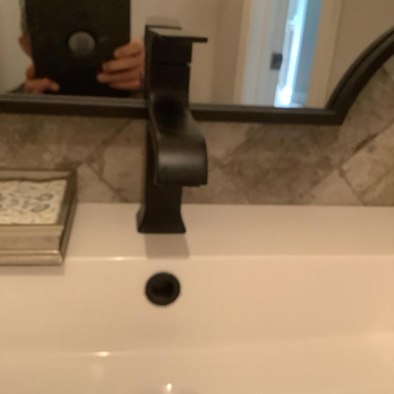Delta black sink faucet on white bathroom vanity Delta black sink faucet on white bathroom vanity