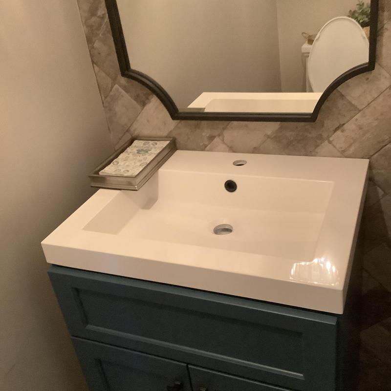 Powder room sink basin without faucet installed Powder room sink basin without faucet installed