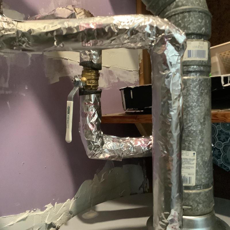 Natural gas water heater piping with valve and insulation Natural gas water heater piping with valve and insulation