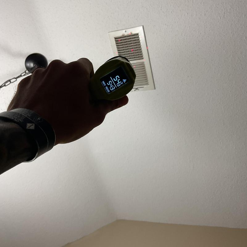 HVAC vent temperature check with infrared thermometer