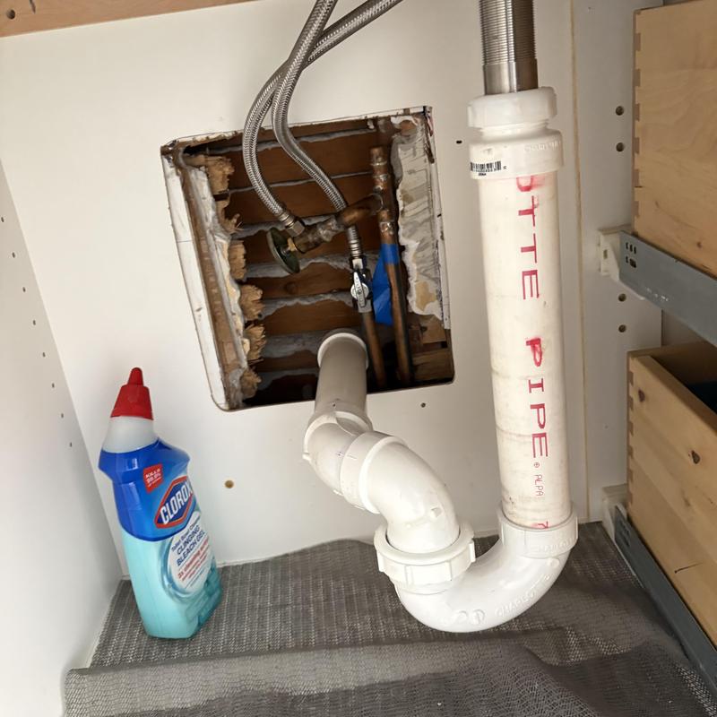 Toilet tank plumbing with cutout wall access Toilet tank plumbing with cutout wall access