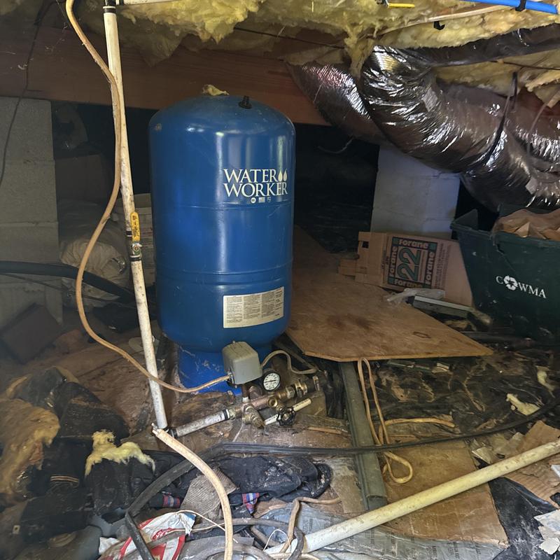 Expansion tank and piping in crawlspace installation Expansion tank and piping in crawlspace installation