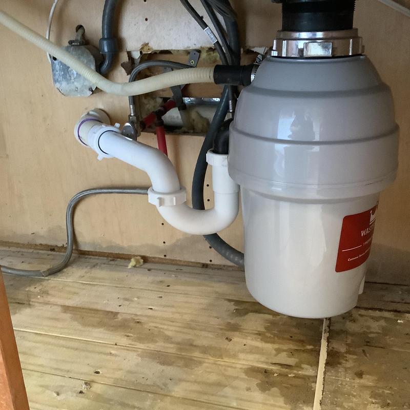 Garbage disposal and kitchen sink plumbing installation Garbage disposal and kitchen sink plumbing installation