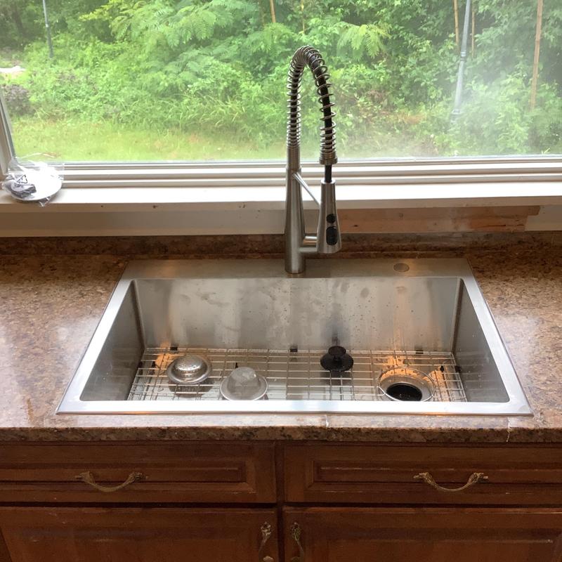 Stainless steel kitchen sink with pull-down faucet Stainless steel kitchen sink with pull-down faucet