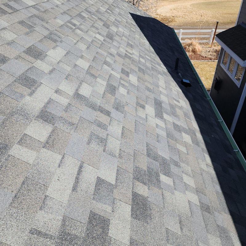 Asphalt shingle roof with pipe jack and flashing maintenance Asphalt shingle roof with pipe jack and flashing maintenance