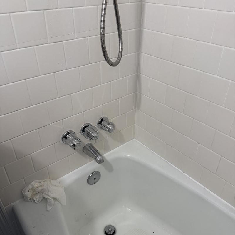 Central brass tub faucet with three chrome stems Central brass tub faucet with three chrome stems