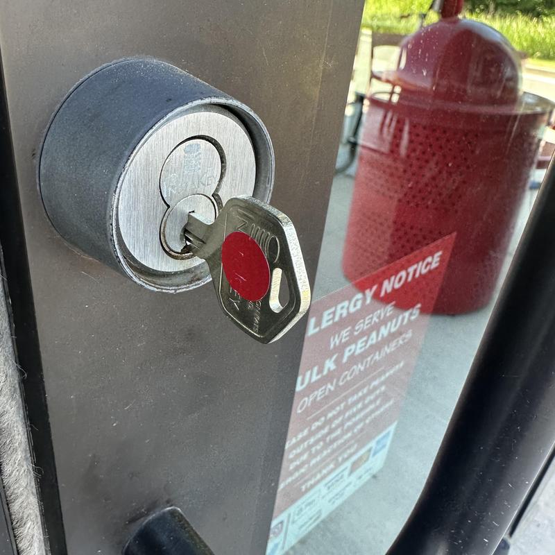Instakey commercial lock with key in door lock cylinder Instakey commercial lock with key in door lock cylinder