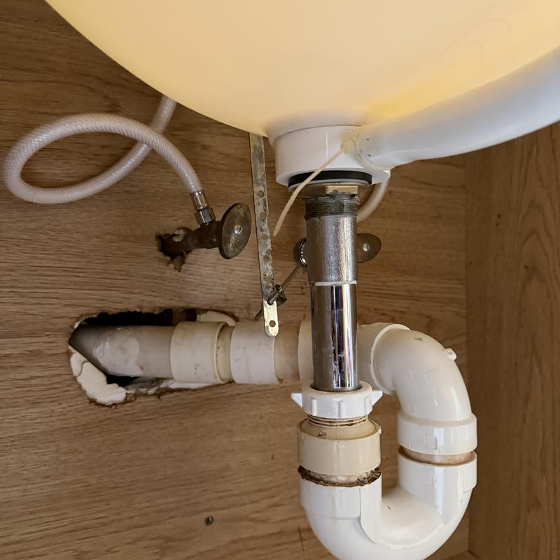 Toilet drain pipe and supply valve installation under sink Toilet drain pipe and supply valve installation under sink