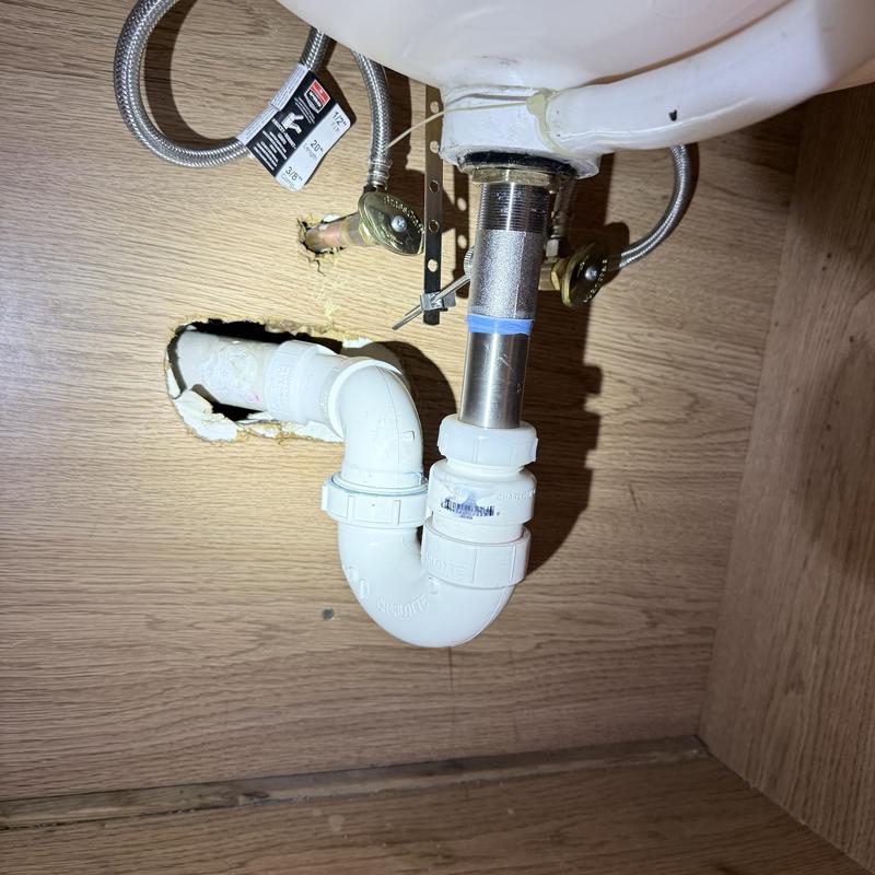 Sink drain trap and supply lines under vanity Sink drain trap and supply lines under vanity