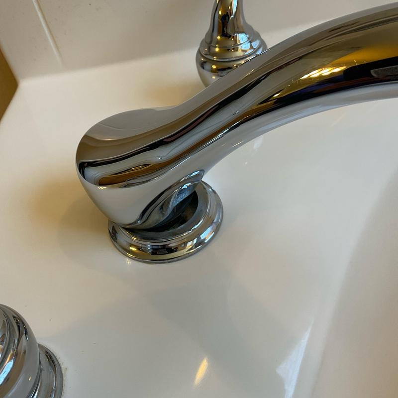 Tub faucet hot water handle twisting on sink