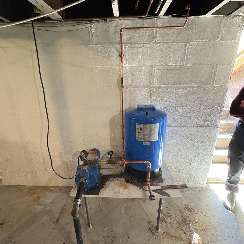 Well pump system with new pressure tank installation Well pump system with new pressure tank installation