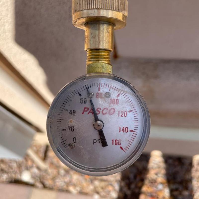 Pressure reducing valve gauge showing 68 psi pressure reading