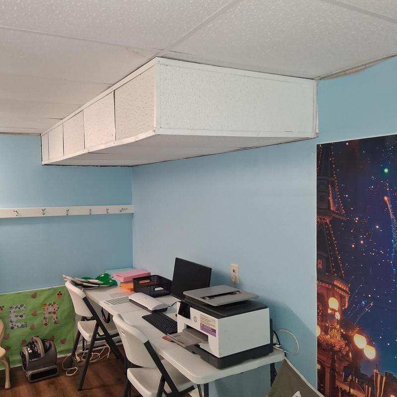 Ceiling tile replacement in office room