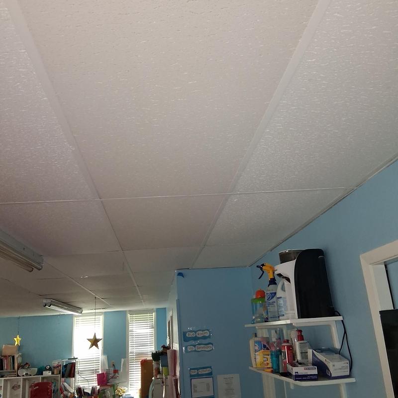 Ceiling tile replacement in residential room