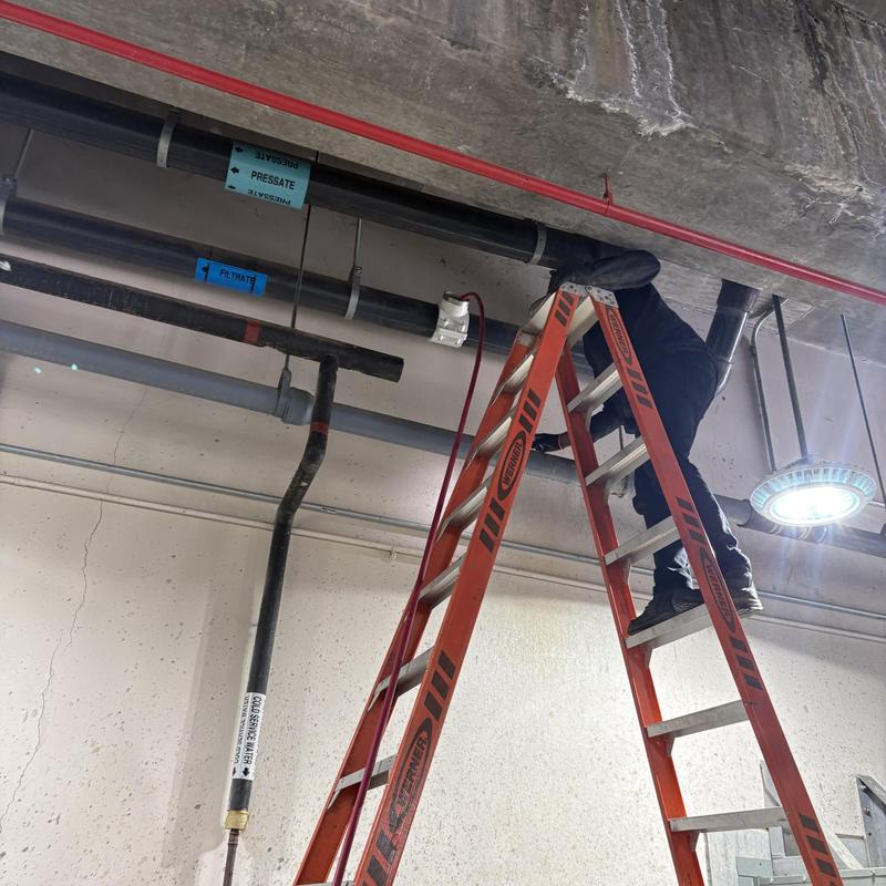 Sanitary lines maintenance jetting on ceiling pipes