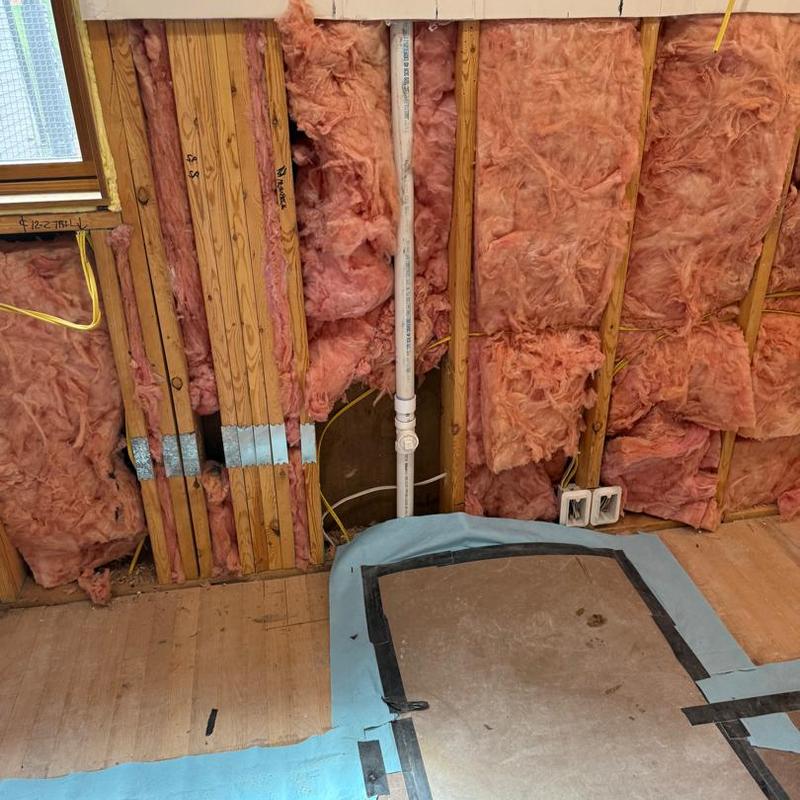 PVC drain pipe with wall insulation in progress