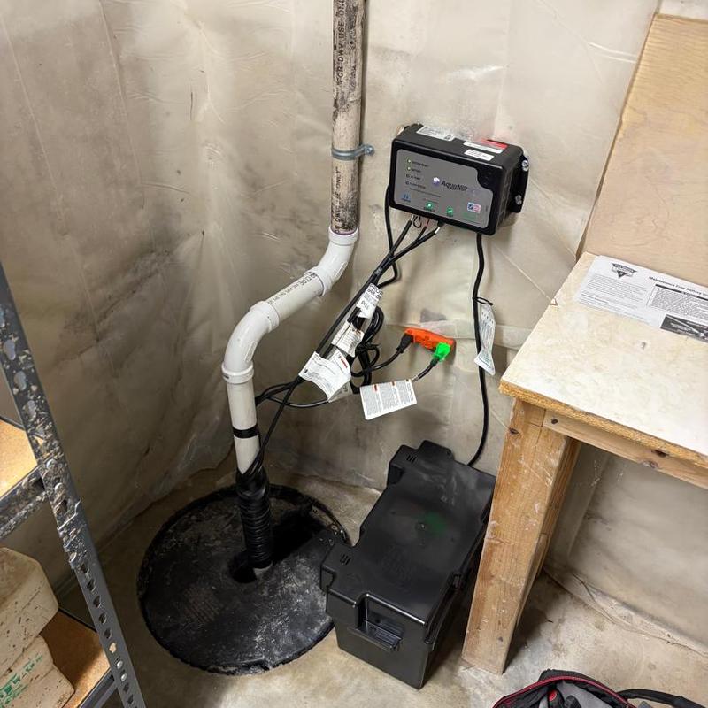 Backup sump pump system with control panel installation