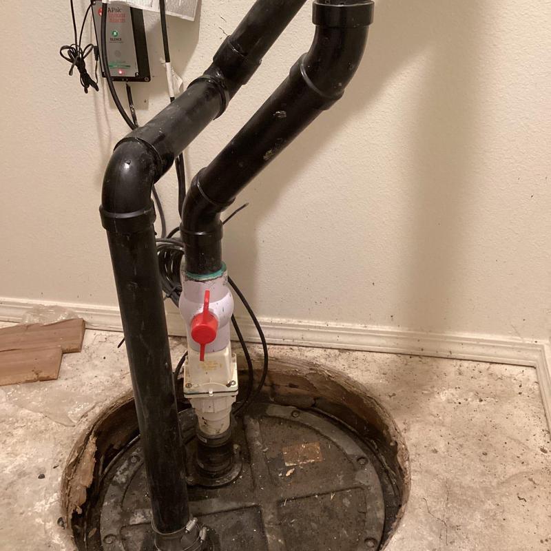 Liberty sump pump with cleaned float and pipes