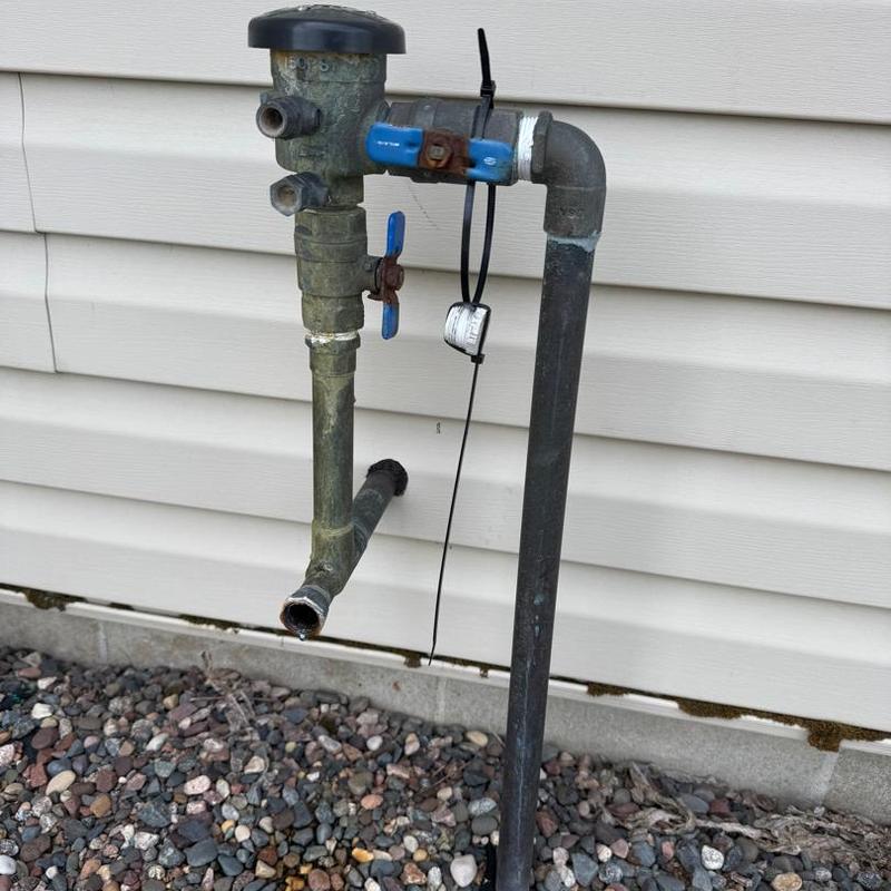 Irrigation backflow valve with shutoff and piping