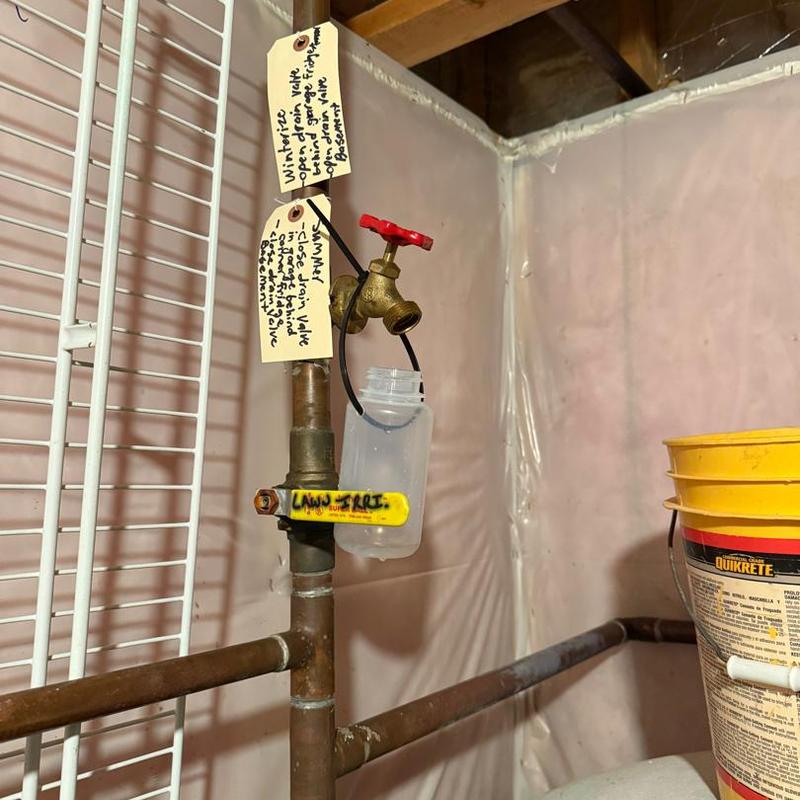 Ball valve and copper pipe irrigation system in basement