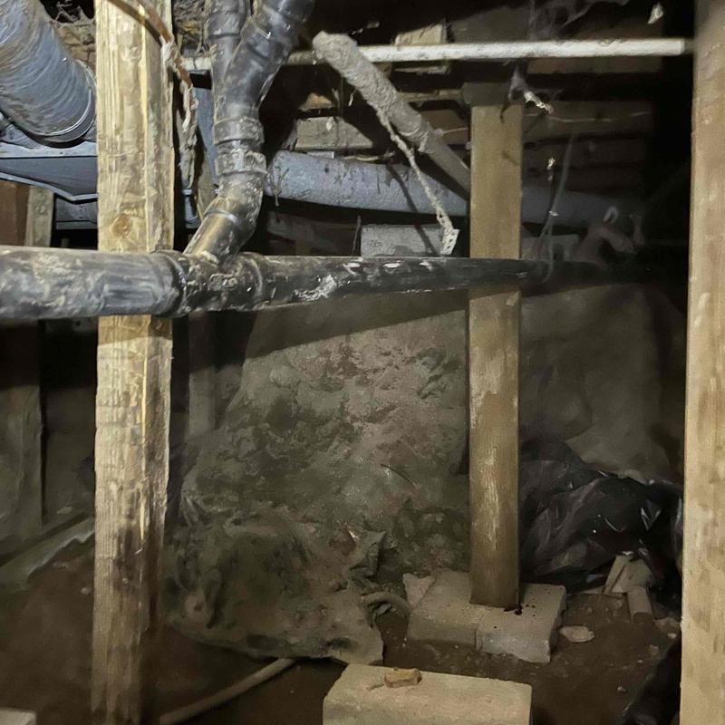 Laundry sink drain pipes in crawl space installation