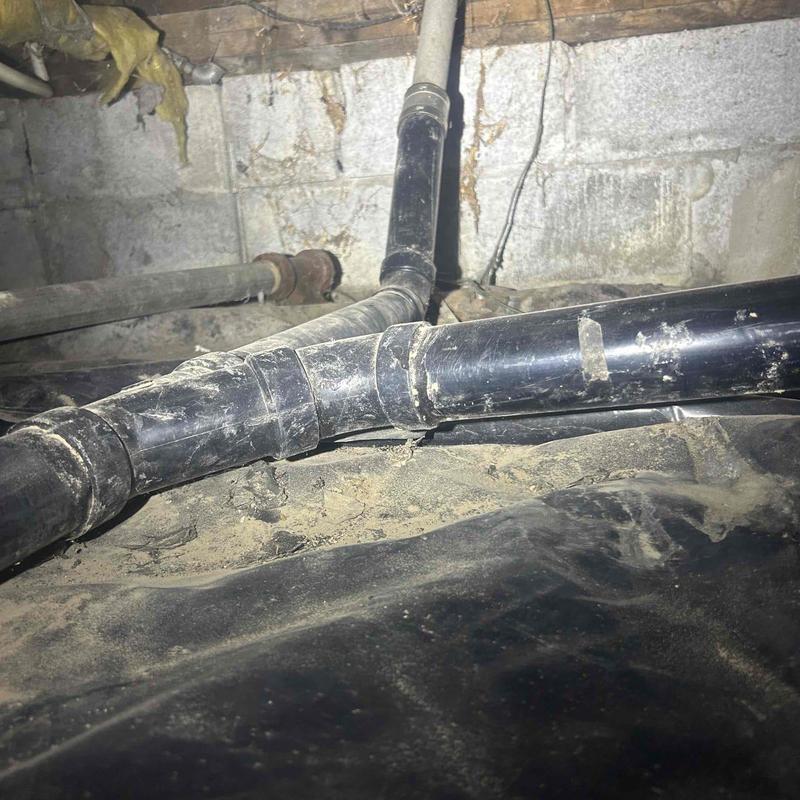 Laundry sink ABS drain pipe in crawl space