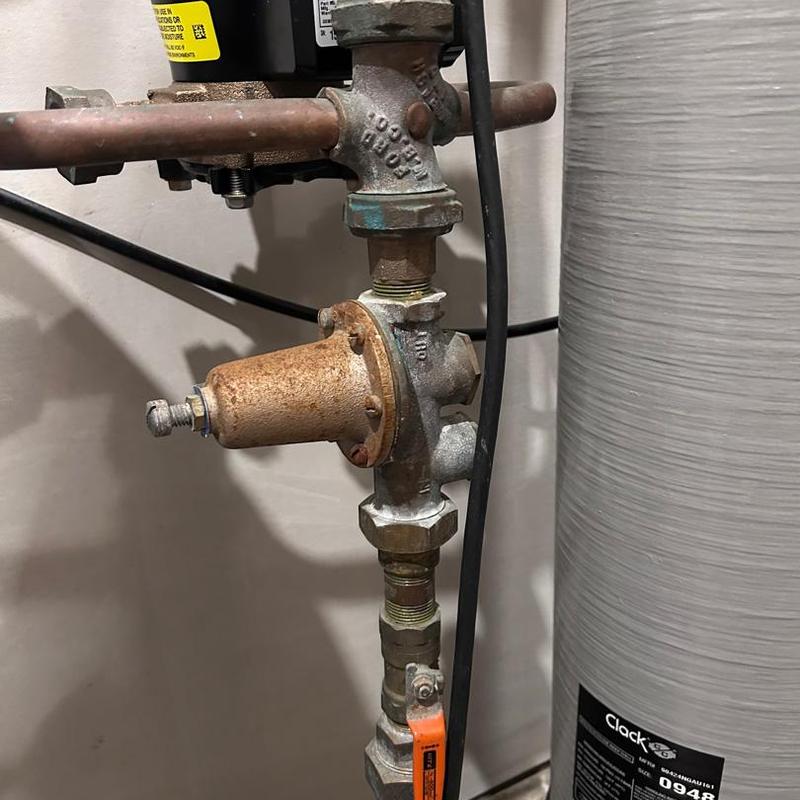 Water heater relief valve and piping near tank