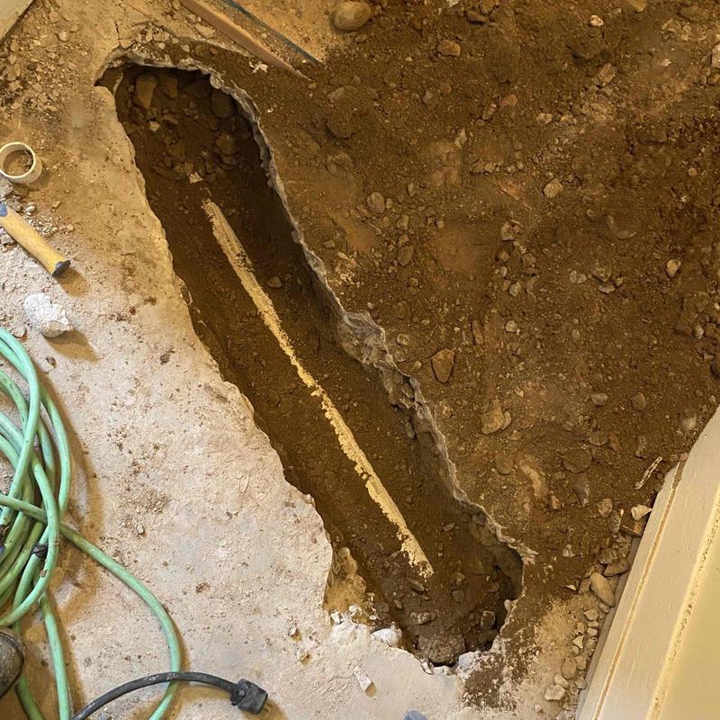 Cast iron branch line excavation for plumbing replacement
