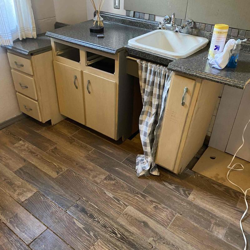 Kitchen sink cabinet removal and plumbing access