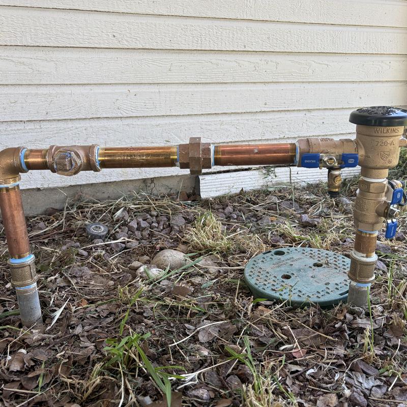 Backflow prevention assembly with new installation and test