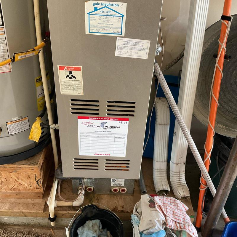 Water heater and HVAC furnace in utility area