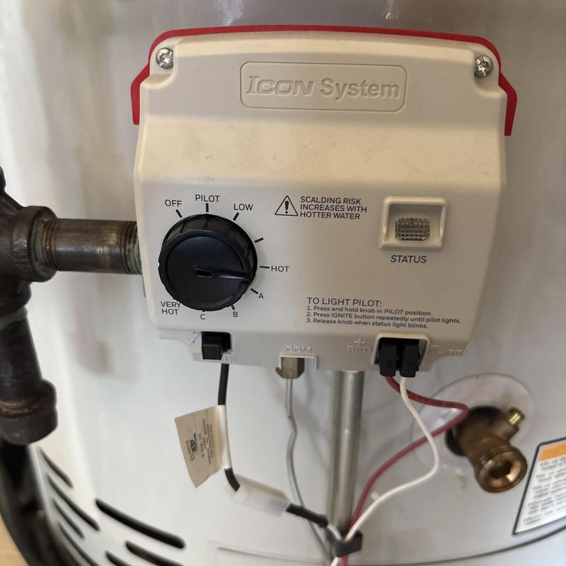 Gas control valve on water heater temperature dial Gas control valve on water heater temperature dial