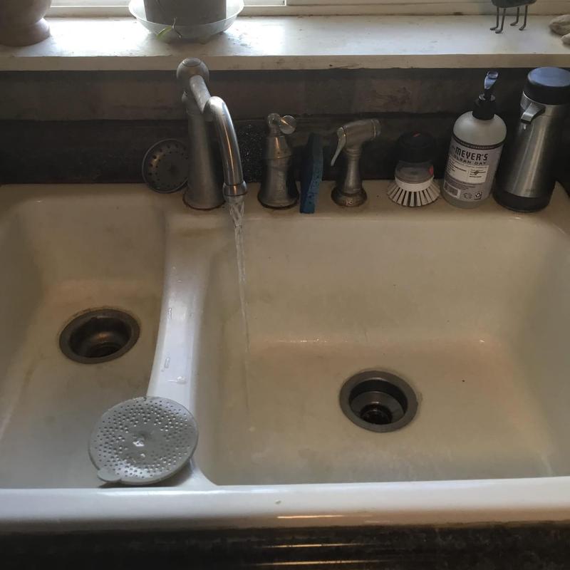 Kitchen sink drain line with faucet running and cleaning tools