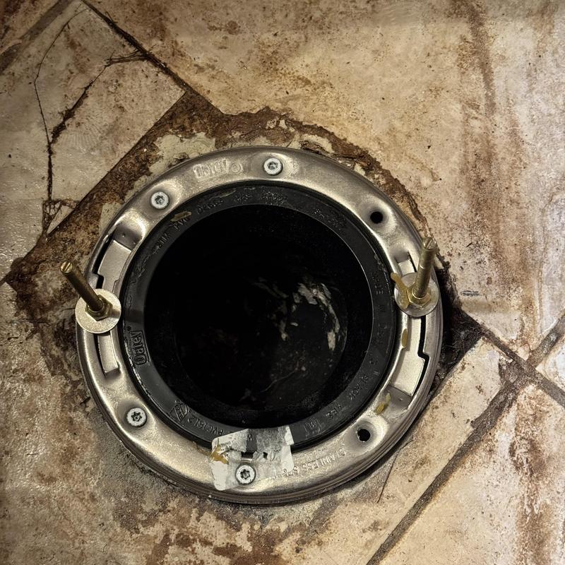 Floor flange installed and anchored to concrete