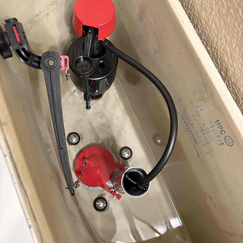 Toilet flush valve and flapper installation inside tank