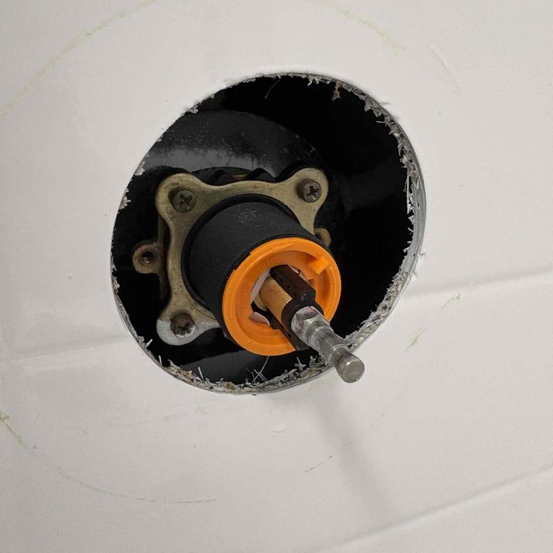 Pfister shower cartridge installed in wall cavity