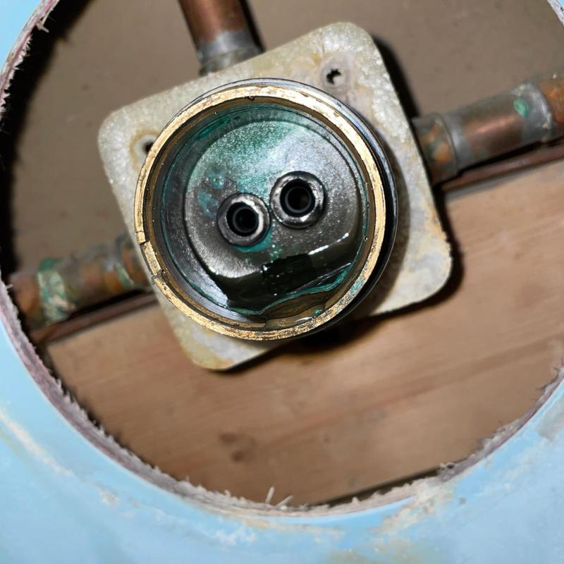 Shower valve cartridge housing with plumbing connections