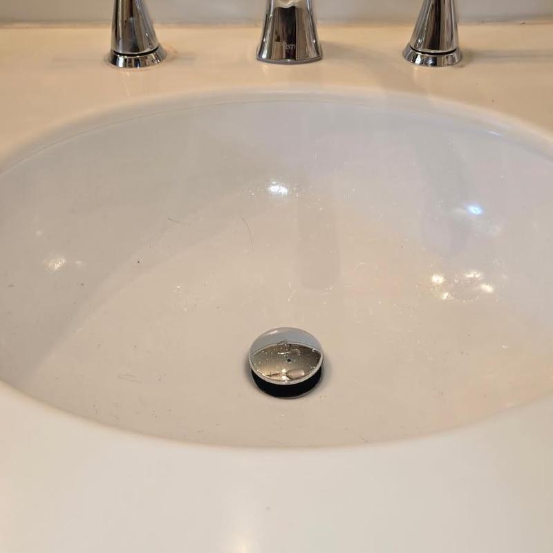 Delta lavatory sink faucet with drain stopper
